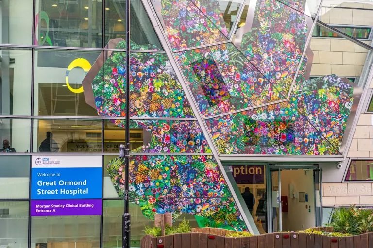 Great Ormond Street Hospital — Morgan Stanley Clinical Building entrance, with the stained-glass artwork on the façade.